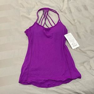 Lululemon Lighten Up Tank size 4.. NWT. Purple